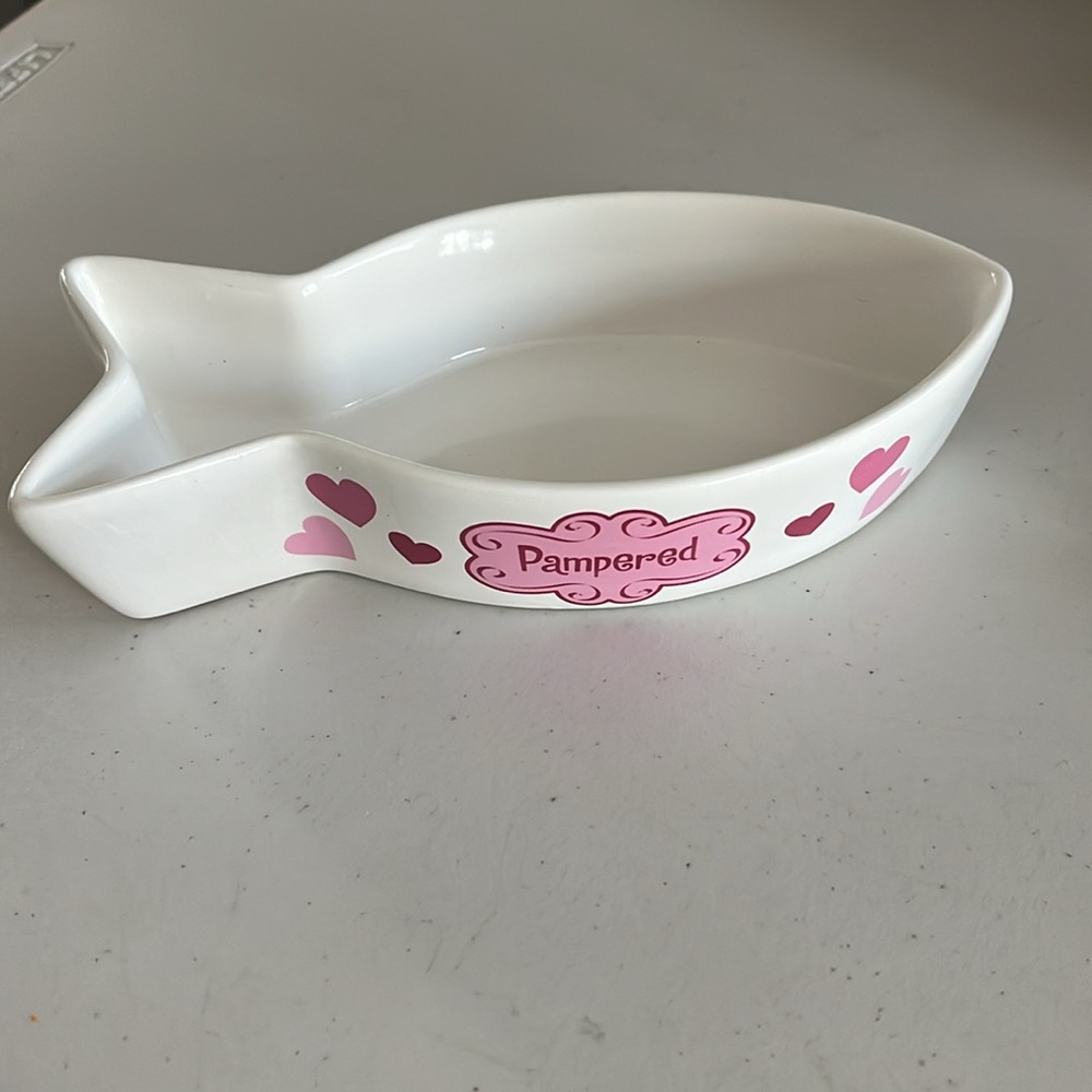 Cat food bowl in a fish style for food. Pampered